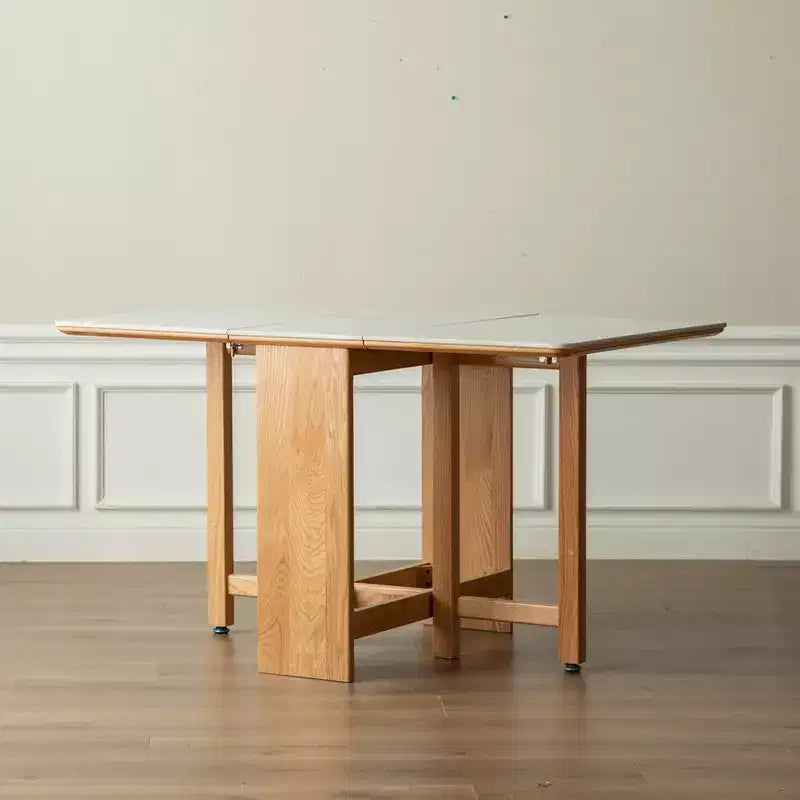 Table à manger extensible moderne avec pieds en chêne massif et plateau en pierre, pour 4 à 6 personnes