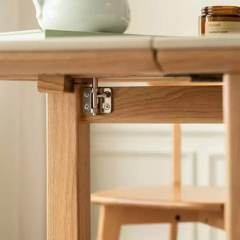Table à manger extensible moderne avec pieds en chêne massif et plateau en pierre, pour 4 à 6 personnes
